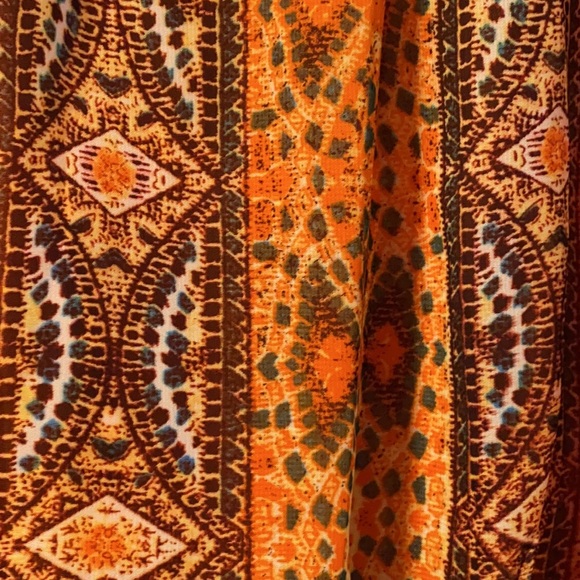 Orange, brown, and green patterned short dress - Picture 2 of 4